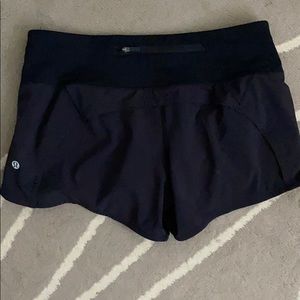 Black lululemon 4in shorts size 6
